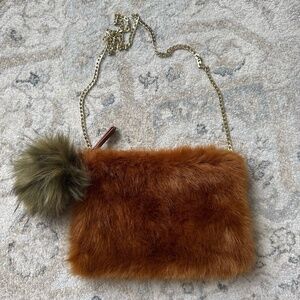 Elegant faux fur clutch
